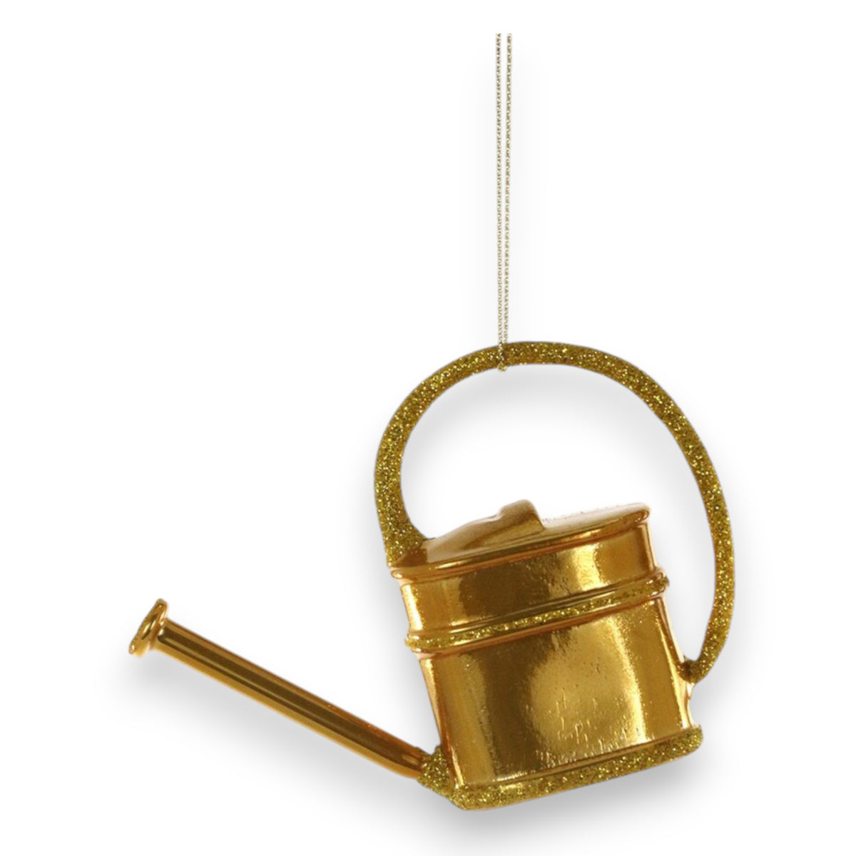 The ENGLISH WATERING CAN ORNAMENT by CODY FOSTER is a shiny gold piece with a curved handle and long spout, hanging from a thin metallic string—perfect for collectors and design lovers—displayed on a plain white background.