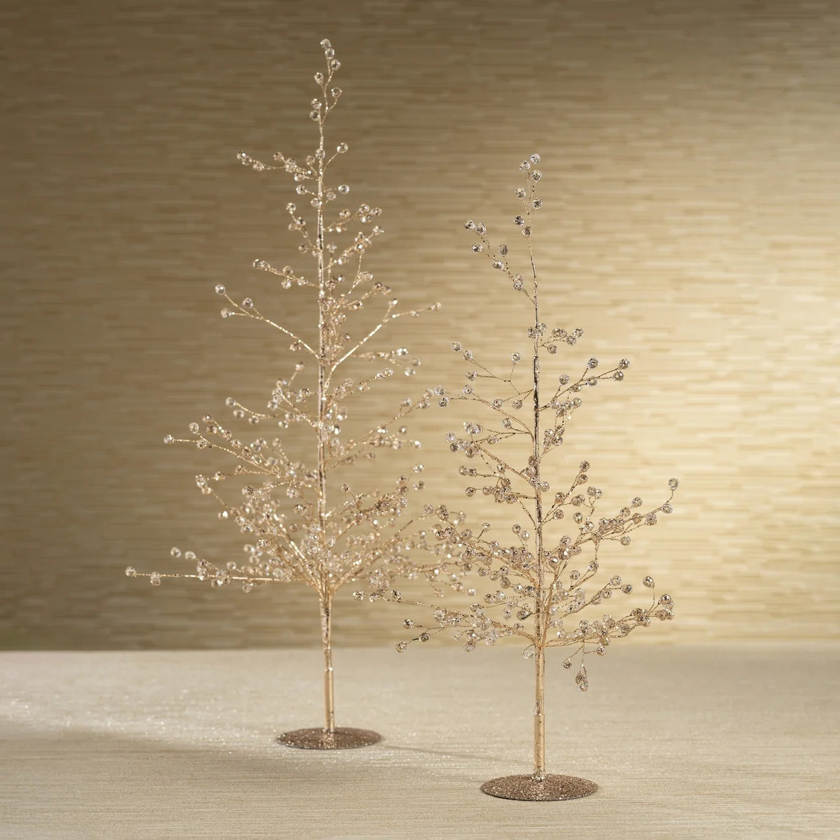 Two BEADED GLASS BERRY TREE - SMALL decorative trees made of glass wire with clear bead accents on the branches, standing on round bases.