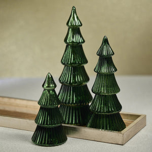 The ZODAX LED RIBBED ANTIQUE GLASS TREE - LARGE is a shiny green, stylized Christmas tree ornament with layered, ribbed glass sections and a hidden LED light, shown standing upright on a plain white background.