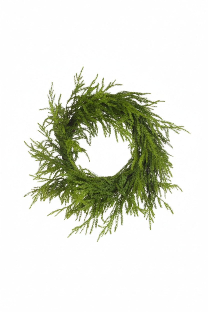 A 26-inch circular REAL TOUCH NORFLOK PINE WREATH made of wispy green pine needles.