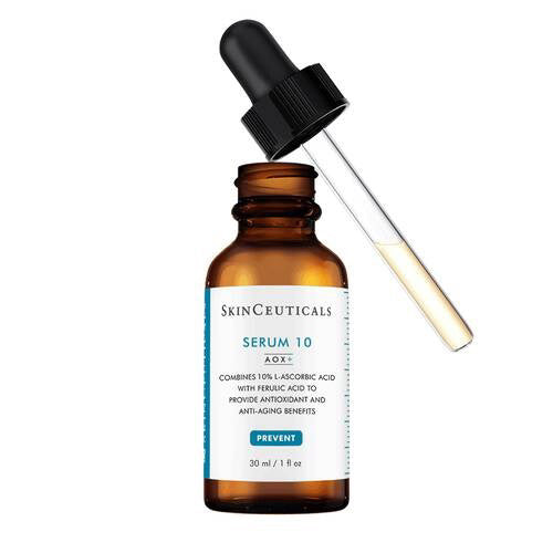 A brown dropper bottle labeled &quot;SKINCEUTICALS - SERUM 10 AOX&quot; stands against a white background. The label mentions it combines 10% L-ascorbic acid with ferulic acid to provide antioxidant and anti-aging benefits for sensitive skin, and the bottle contains 30 ml (1 fl oz) of product.