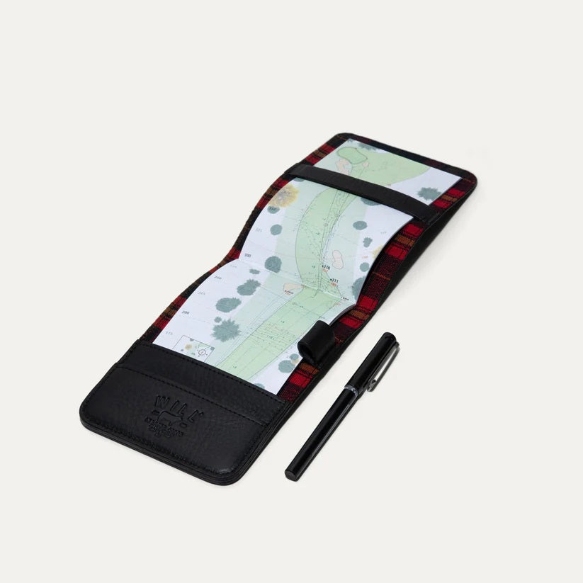 The WILL LEATHER GOODS - GOLF YARDAGE BOOK IN BLACK is shown closed from an angled top view, crafted from subtly textured full-grain leather against a plain white background.