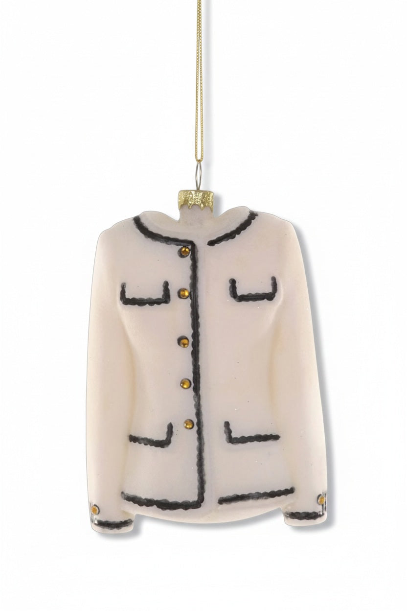 A 4.25-inch LUXE TWEED JACKET ORNAMENT shaped like a white jacket with black trim and gold buttons.
