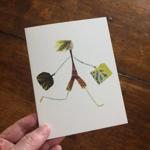 The PETAL PEOPLE PRESS - BON VOYAGE CARD by PETAL PEOPLE PRESS features a whimsical figure crafted from plant parts, with leaf details and shopping bags—a charming choice for botanical art greeting cards or pressed flower notecards.