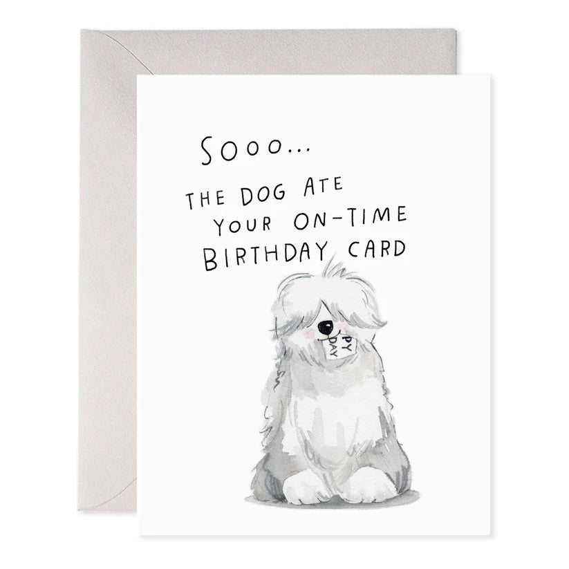 The E. FRANCES PAPER - SHEEPDOG BELATED GREETING CARD showcases a handcrafted watercolor of a fluffy, sad-looking sheepdog with the caption "Sooo... the dog ate your on-time birthday card," and comes with a gray envelope.