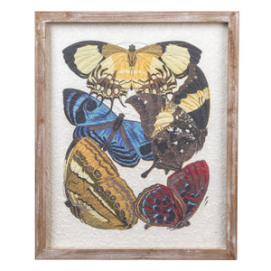 The CREATIVE COOP FRAMED BUTTERFLY ARTWORK displays six colorful butterflies with yellow, blue, brown, and red wings in a circular pattern on a white textured background with a rustic wooden frame—ideal for unique wall décor.