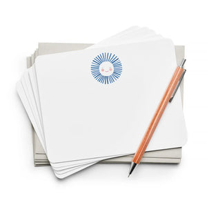 The E. FRANCES - FLAT NOTES BLUE SUNSHINE by E. FRANCES PAPER features a blank notecard with rounded corners and a cheerful sun at the top, paired with a plain white envelope—perfect illustrated stationery for hand-written notes on any occasion.