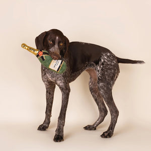 Crafted by CHEWFFON, the PLUSH CHAMPAGNE BOTTLE SQUEAKY DOG TOY is designed to resemble a champagne bottle with playful gold, black, and red accents. The neck features the label “CHAMPUTON,” while the front reads “CHAMPAGNE WOOF & PAWTY FUR TAILS BRUT.” This interactive dog toy is perfect for pups who love to celebrate.