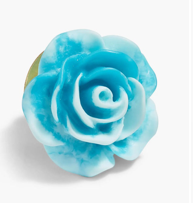 The CLIFTON WILSON - RESIN LAPEL FLOWER PIN is a detailed yellow rose accessory with smooth petals, evoking elegance and charm—a unique formalwear accent—presented against a plain white background.