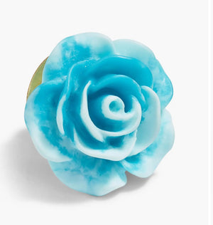 The CLIFTON WILSON - RESIN LAPEL FLOWER PIN is a detailed yellow rose accessory with smooth petals, evoking elegance and charm—a unique formalwear accent—presented against a plain white background.