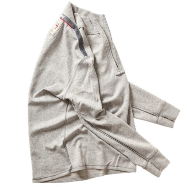 RELWEN - Wool and Cotton Quarter Zip in Light Grey Heather, a long-sleeve pullover sweater from RELWEN, is laid flat on a white background. This lightweight, layer-ready sweater features a soft, slightly textured double-faced knit fabric and displays a visible tag near the quarter-zip collar.