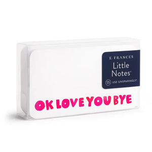 The E. FRANCES PAPER "LITTLE NOTES OKLOVEYOUBYE" set includes white mini cards with "OK LOVE YOU BYE" in pink, a smiley face on the back, and a yellow pencil—perfect for sharing heartfelt notes.