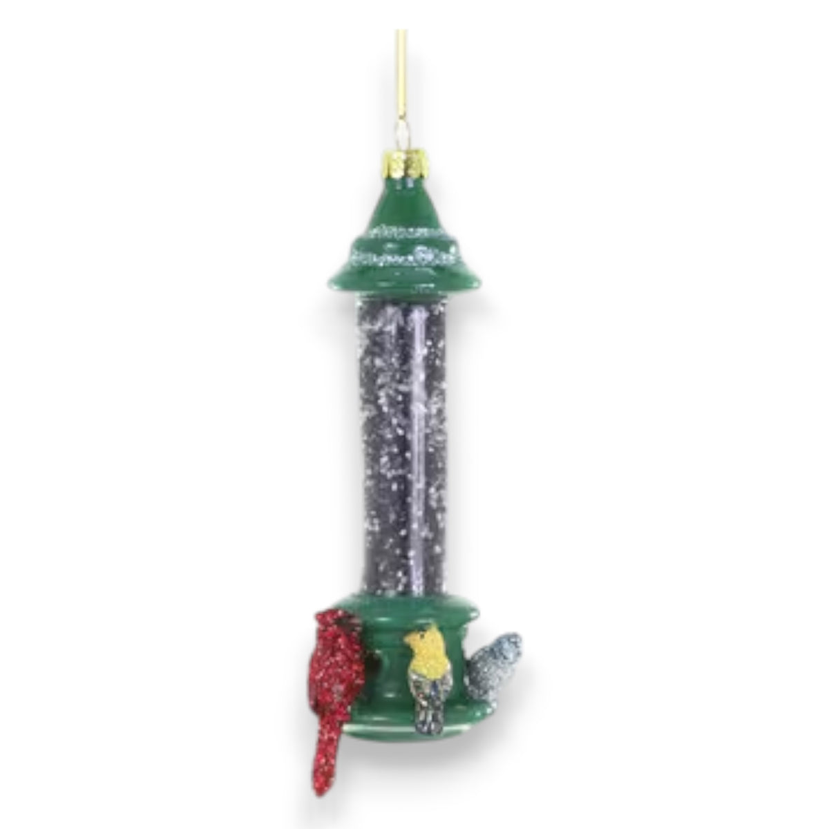 The CODY FOSTER BIRD FEEDER ORNAMENT features a green roof and base with three glittery birds—red, yellow, and blue—perched around it. Hanging from a gold string, it’s a charming piece for collectors or design lovers.