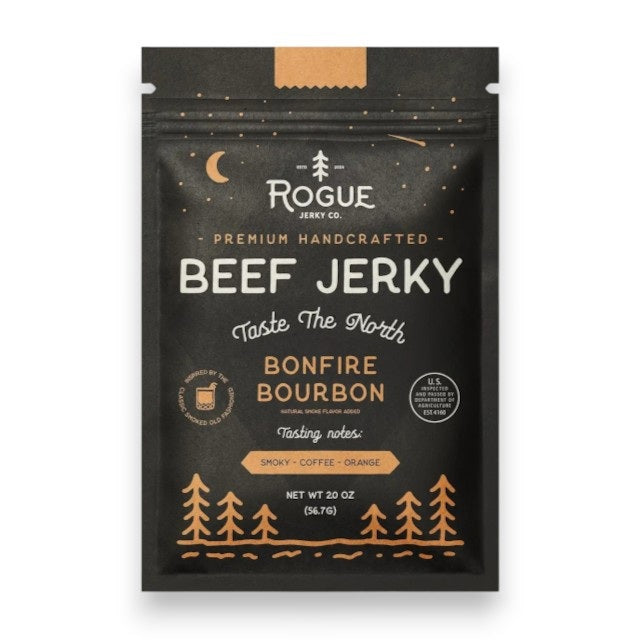 A 2 oz black bag of ROGUE JERKY – BONFIRE BOURBON BEEF JERKY by ROGUE JERKY CO., featuring orange graphics of trees and stars along with tasting notes—smoky, coffee, and orange. This artisan beef jerky is a protein-packed snack with “Taste The North” displayed on the packaging.