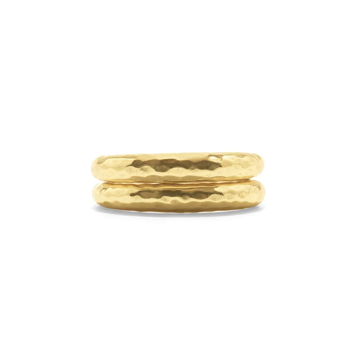 The CAPUCINE DE WULF - CLEOPATRA SLICE STACKING RINGS, featuring a textured hammered finish of 18K Gold over Brass, are displayed on a white background. Their shiny surface subtly reflects light.