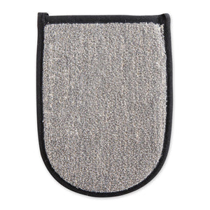 An image of the BAMBOO CHARCOAL BATH MITT by EUROPEAN SOAPS, LLC features a mitt with rounded edges, crafted from a rough, textured material and accented with black fabric trim along the sides and top opening. Perfect for your spa products collection, this mitt is designed to enhance your skincare routine by scrubbing and exfoliating the skin during showers.