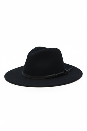 The BILLIE FEDORA HAT by WYETH is a tan wool felt fedora with a leather trim, showcasing a pinched crown and mid brim, beautifully displayed against a plain white background.