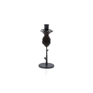 The ZODAX PINE CONE DESIGN WROUGHT IRON CANDLE HOLDER - SHORT features a black pinecone shape on a slender stem with a round base, displayed upright against a white background.