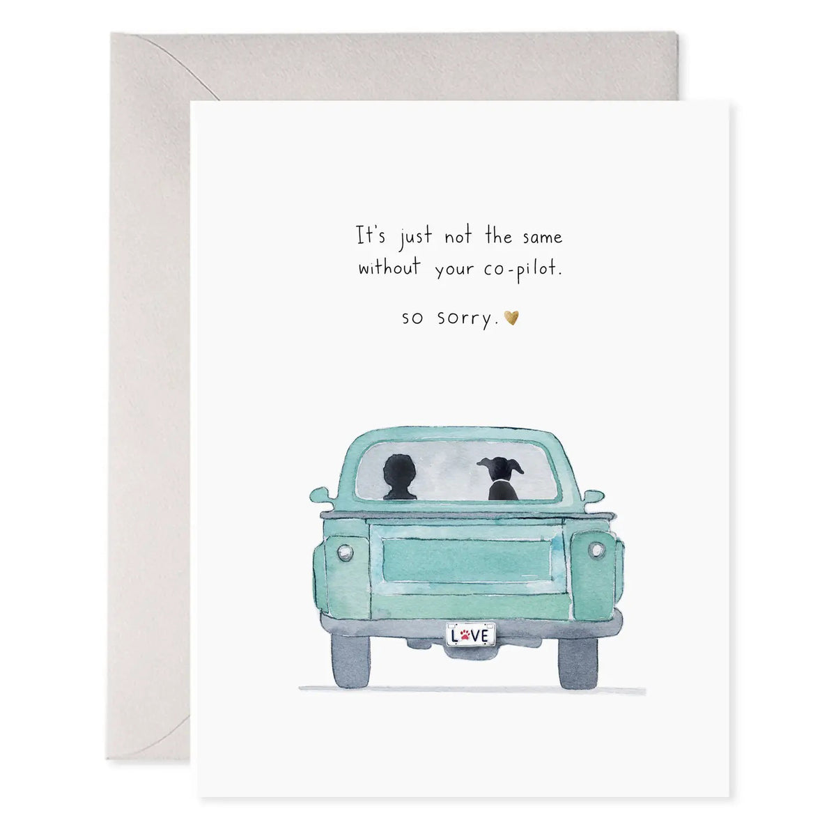 The E. FRANCES - CO PILOT DOG CARD by E. FRANCES PAPER features a watercolor person and dog in a blue truck, with gold foil, &quot;LOVE&quot; license plate, and the message: &quot;It&#39;s just not the same without your co-pilot. so sorry.
