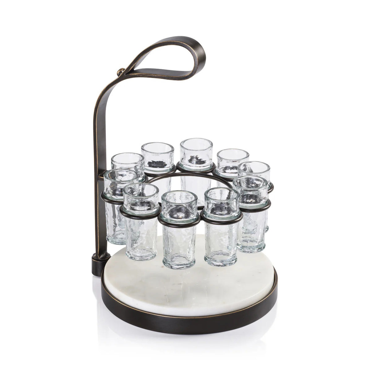 The ZODAX TEQUILERO 10 Shot Tequila Set with Marble Cutting Board is displayed on a table, featuring tequila bottles, lemon wedges, and clear iron-trimmed shot glasses against a dark textured background.