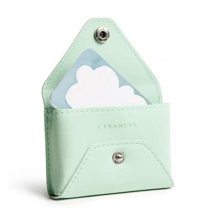 A hand holds the E. FRANCES - E. FRANNIE PACK, SEAGLASS wallet and a "THANKS! You're the best!" Little Note from E. FRANCES PAPER as a joyful gift, with @efrancespaper shown in the corner.
