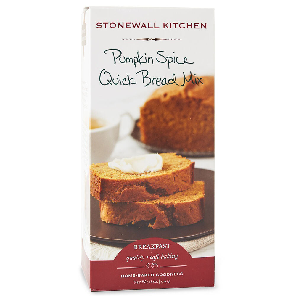 A box of STONEWALL KITCHEN - PUMPKIN SPICE QUICK BREAD MIX is shown. The front of the box features an image of a loaf and slices of pumpkin quick bread with a dollop of whipped topping. Text on the box highlights it as a breakfast item with "home-baked goodness.