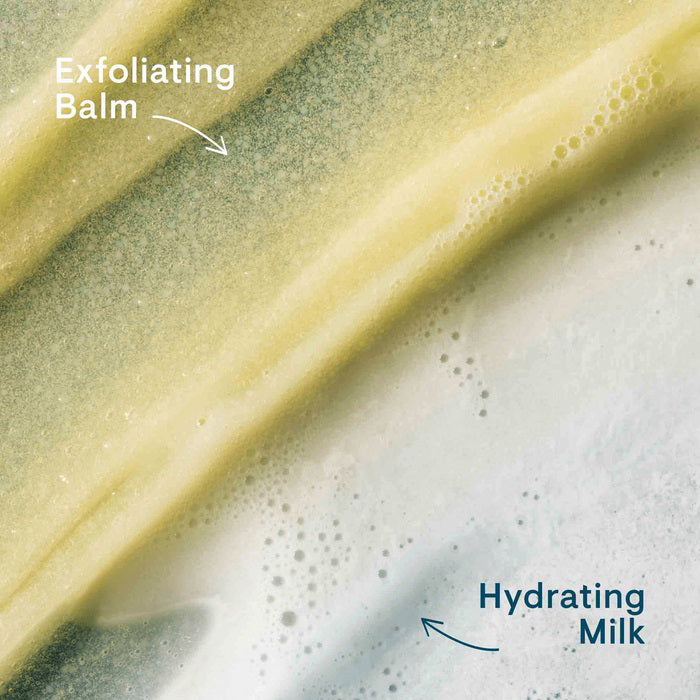 A tube of ELEMIS - PRO-COLLAGEN GLOW BOOST EXFOLIATOR by ELEMIS - STEINER lies next to a dollop of its contents on a light surface. Text explains the key ingredients: starflower oil, rose &amp; mimosa waxes, padina pavonica, and cellulose exfoliating beads, highlighting their benefits.