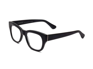 CADDIS - MIKLOS READERS by CADDIS, featuring black rectangular bio-based acetate frames with a thick design, displayed at an angle on a white background.