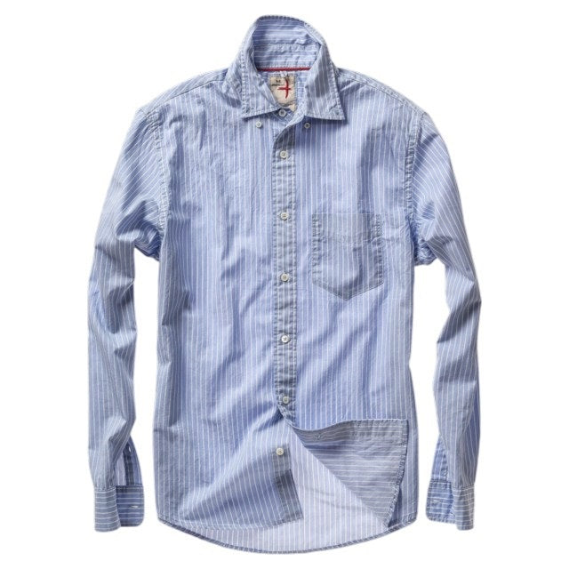 A close-up of the RELWEN - Dress Blues Shirt in Blue with White Stripe Twill by RELWEN, showcasing its light blue 100% cotton twill fabric with fine white stripes, white buttons, a classic collar, and detailed stitching that highlights the quality craftsmanship.