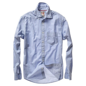 A close-up of the RELWEN - Dress Blues Shirt in Blue with White Stripe Twill by RELWEN, showcasing its light blue 100% cotton twill fabric with fine white stripes, white buttons, a classic collar, and detailed stitching that highlights the quality craftsmanship.