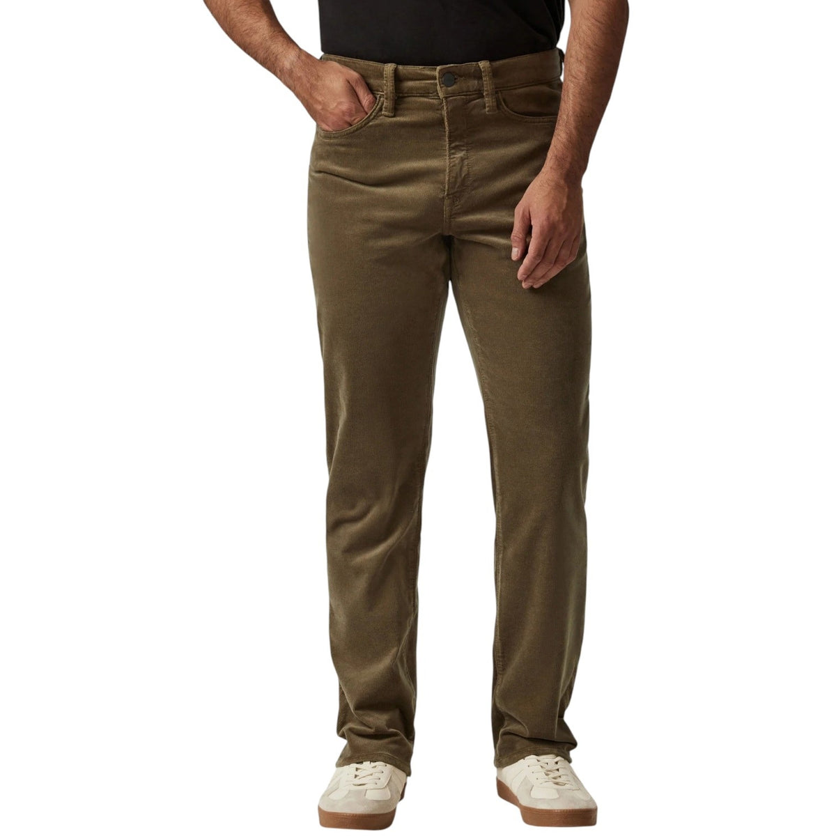 Man wearing 34 HERITAGE - COURAGE STRAIGHT LEG CORDUROY PANTS IN TOBACCO and white sneakers.