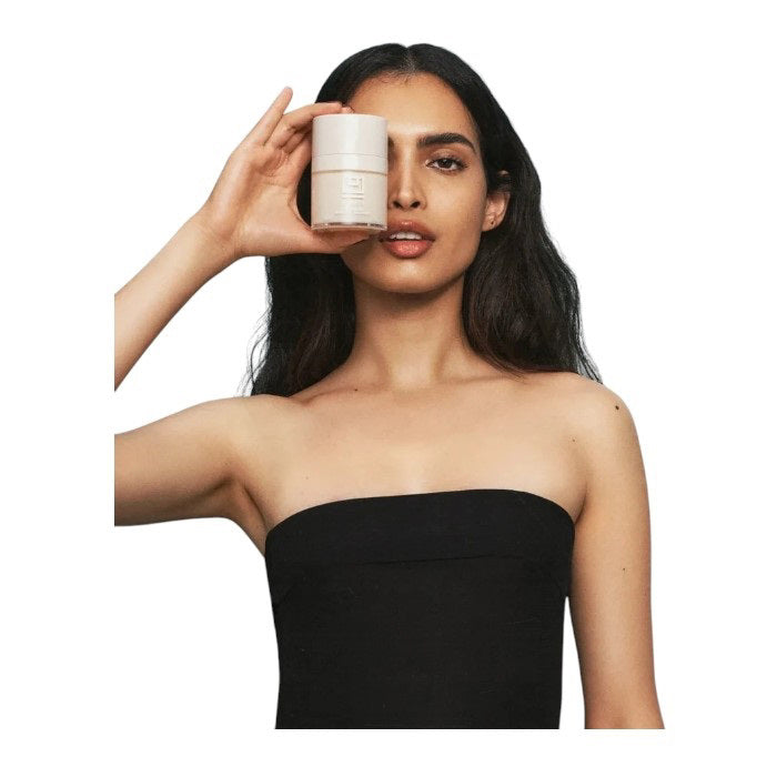 A white cylindrical 50ml jar of U BEAUTY THE BARRIER BIOACTIVE TREATMENT, featuring black text and the logo—a gel-cream overnight treatment that supports the skin’s moisture barrier.