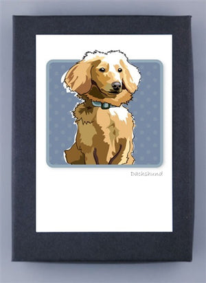 The PAPER RUSSELLS - DACHSHUND BOX NOTES features a fluffy dachshund with a blue collar against a blue polka dot background, printed on recycled paper with "Dachshund" elegantly written beneath.