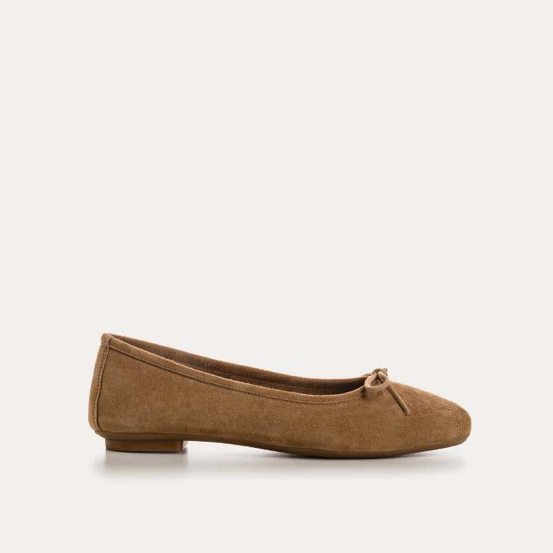Top view of the REQINS - HARMONY SUEDE BALLERINA FLAT IN NATURAL, featuring a square toe and elegant bow detail—classic women's footwear by REQINS on a simple light background.