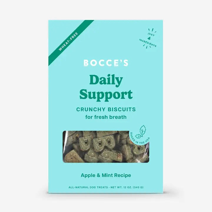 A turquoise box of BOCCE'S BAKERY BREATH BISCUITS—mint and apple dog treats for fresh breath. The window shows the treats, and the box notes they're wheat-free and made with all-natural ingredients.