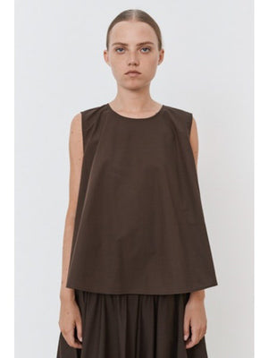 A close-up of the MEIMEIJ Sleeveless Cotton Top reveals dark cotton poplin fabric with textured, subtle horizontal lines and a slightly uneven surface in a deep, muted purple shade.