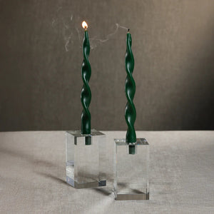 The ZODAX SQUARE CRYSTAL GLASS TAPER HOLDER 4.75" is a transparent, rectangular glass holder with a square cap, shown on a white background. Its sharp edges and clean design make it a stylish decorative piece.