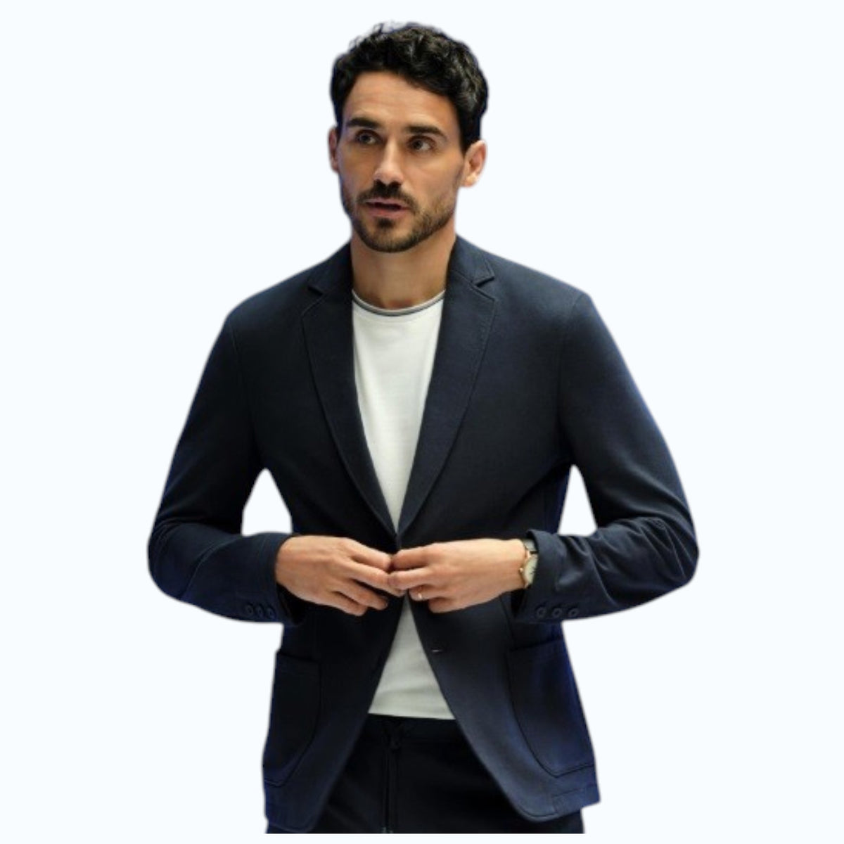 The MACK WELDON Ace Blazer in Total Eclipse is a navy blue men’s French terry blazer with two buttons, two front pockets, and notched lapels, shown against a light background.