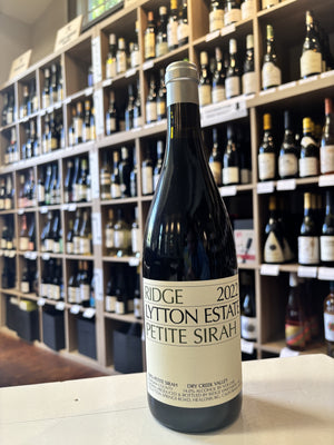 A bottle of RIDGE LYTTON SPRINGS PETITE SIRAH 2022 wine from WINE: WINEBOW, featuring a cream-colored label with black text, set against a plain white background.