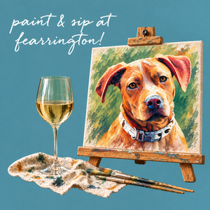 Guests seated at a table enjoy the PAINT & SIP EVENING AT FEARRINGTON by FEARRINGTON VILLAGE, with blank canvases, paint palettes, brushes, paper cups, and a glass of white wine on the table.