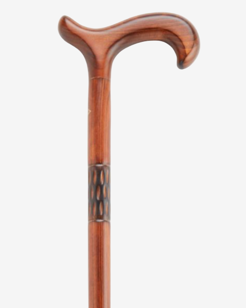 A wooden walking cane with a curved handle and a decorative textured band near the top.