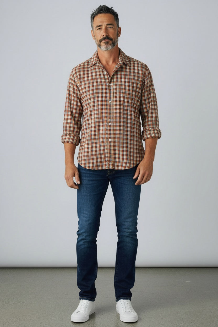 The FRANK &amp; EILEEN Finbar Men’s Button Up Shirt is crafted from premium Italian flannel and features a yellow plaid pattern. This long-sleeve shirt includes a chest pocket, folded collar, and displays the “Frank &amp; Eileen” brand label inside the collar.