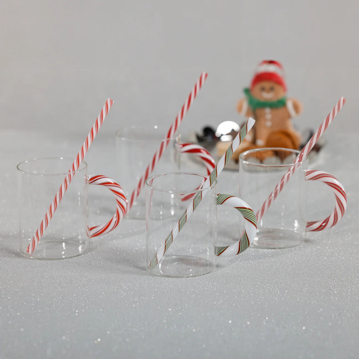 The ZODAX DRINKING STRAWS - SET OF 5 features red and white striped 7.75-inch paper straws, some with green diagonal stripes, arranged parallel on a white background to showcase their size and design.