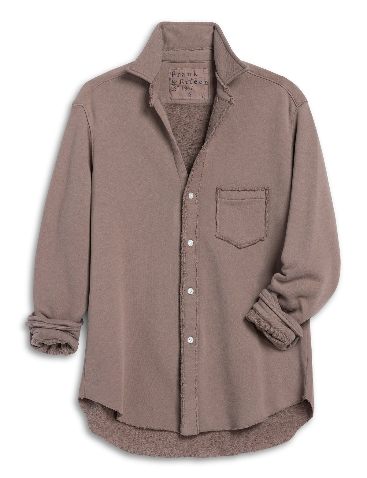 The FRANK &amp; EILEEN EILEEN Relaxed Button Up in Triple Fleece Brulee features a beige hue, bust-flattering buttons, raw edges, rolled sleeves, a chest pocket, and garment-dye finish. Shirt is shown laid flat on a white background.