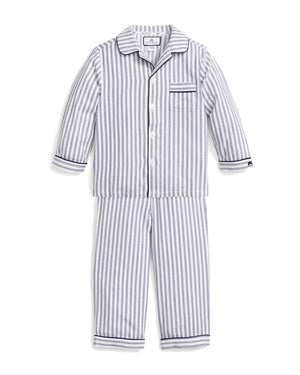 The PETITE PLUME FEARRINGTON LIFESTYLE COLLECTION - CHILDREN'S TWILL NAVY FRENCH TICKING PAJAMA SET is a delightful option for kids, featuring long sleeves and pants with chic vertical white and gray stripes. This set is crafted from yarn-dyed cotton, boasting a top with a collar, full button-down front, and a single chest pocket adorned with matching fabric piping along the cuffs and pocket opening.