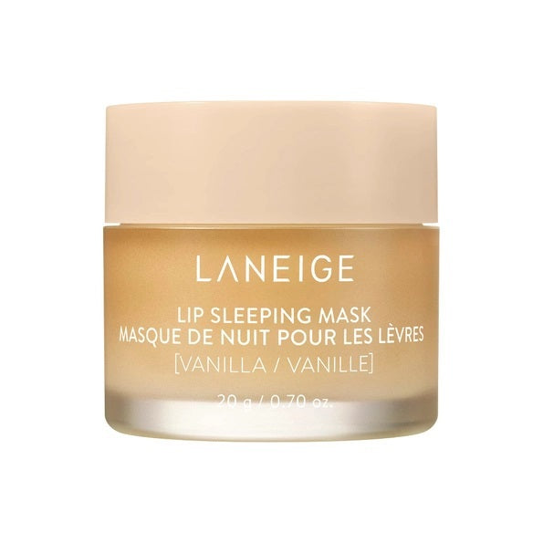 A jar of LANEIGE - LIP SLEEPING MASK, VANILLA from KOSMIC KBEAUTY SKINCARE features a beige lid and frosted container labeled in both English and French, delivering intense overnight moisture to help soothe and repair dry lips as you sleep.
