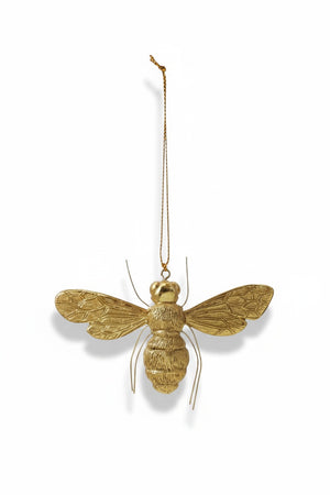 BEE ORNAMENT WITH WIRE LEGS by CREATIVE COOP, a gold resin bee hanging from a thin string with textured wings and thin wire legs in a polished gold finish.
