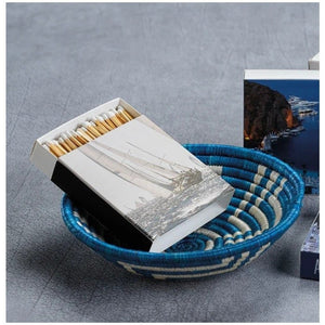 Two ZODAX MATCH BOX - SAILING matchboxes feature a sailboat photo on the cover and “APOTHECARY GUILD” on the side; one open to reveal long decorative matches, ideal for any sailing-themed collection.