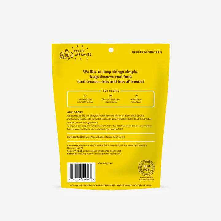 A yellow and cream BOCCE'S BAKERY BAC N NUTTY BISCUITS bag features wheat-free, bone-shaped dog treats made with peanut butter and bacon.