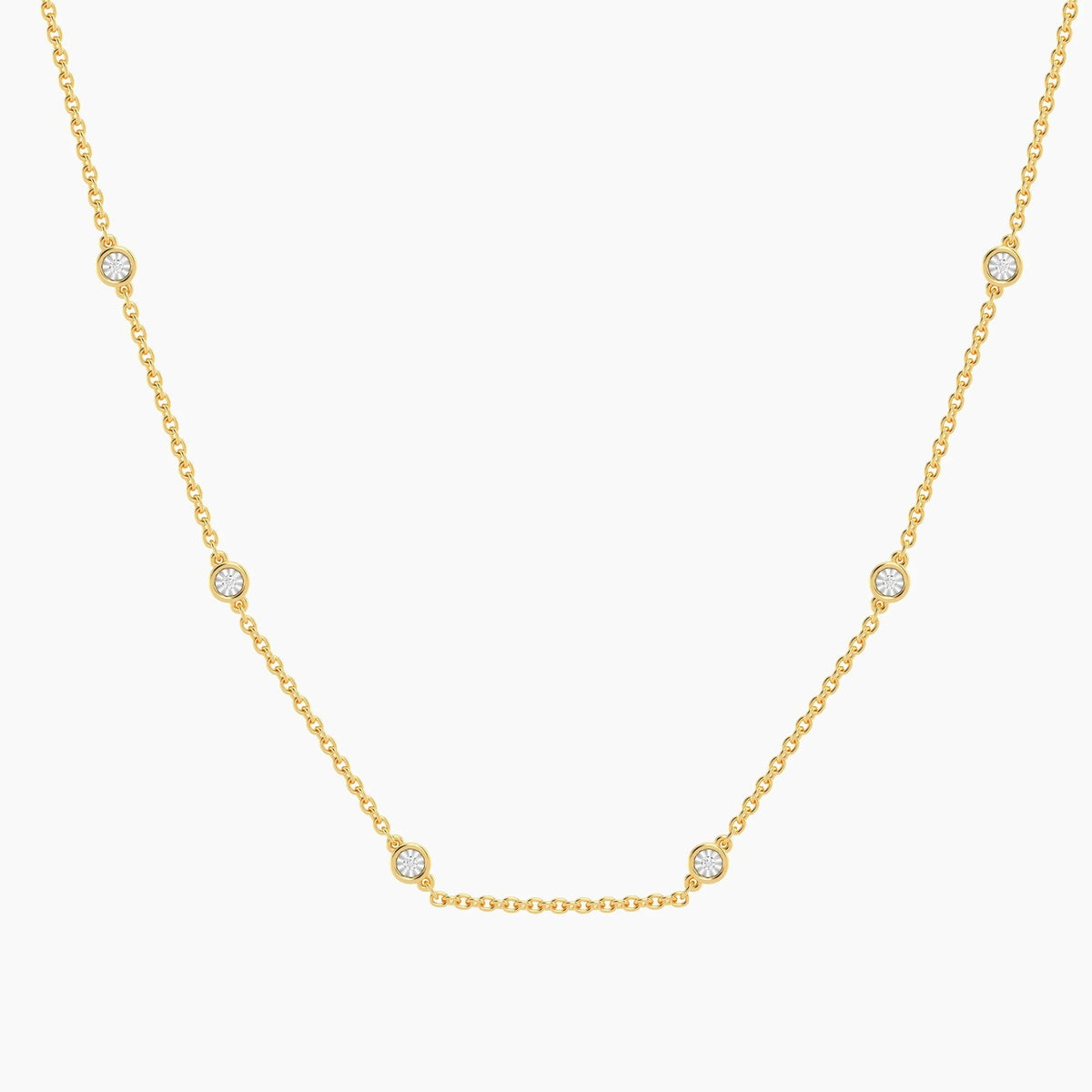 The ELLA STEIN - IN THE LOOP NECKLACE (16″) by ELLA STEIN is a delicate gold chain necklace featuring evenly spaced small round natural diamonds set in bezels along the chain.
